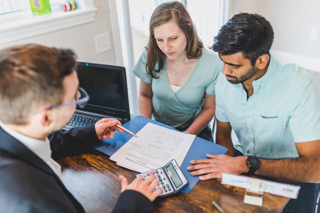 Realtor closing on a deal with his clients