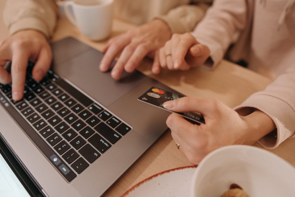 A person using device and adding personal information 