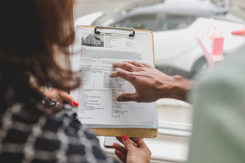 Home buyers checking out property listing