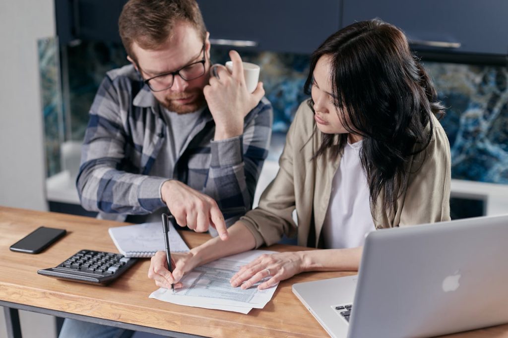 A couple discussing home prices 